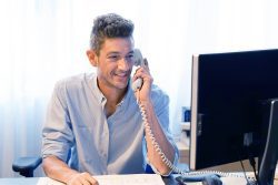 Close-up of an call center worker.