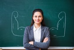 smiling teacher near the board